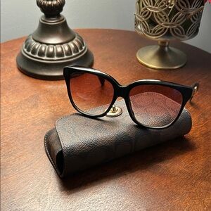 Gucci Black Sunglasses with Red-Tinted Lenses